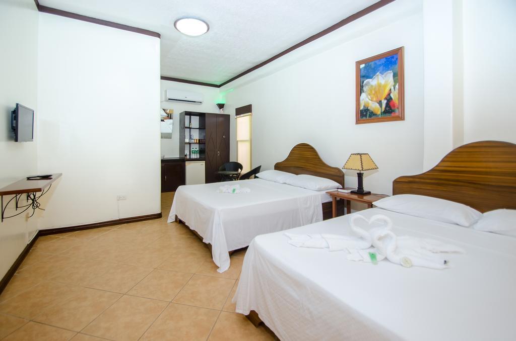 Turtle Inn Resort Manoc-Manoc Номер фото