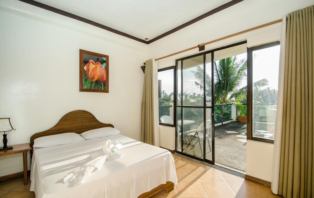 Turtle Inn Resort Manoc-Manoc Номер фото